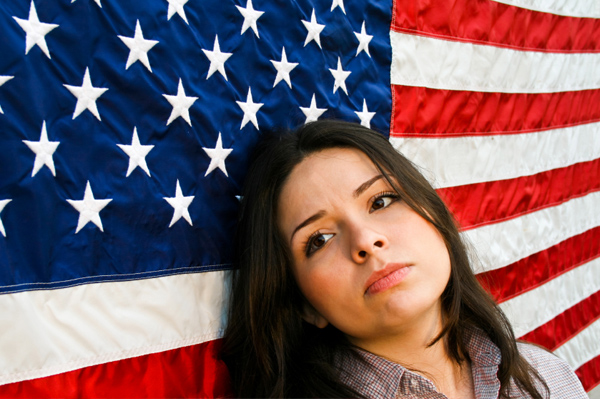 Anxious Woman in front of American Flag