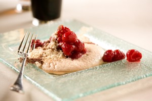 Raspberries with stout foam and dark chocolate