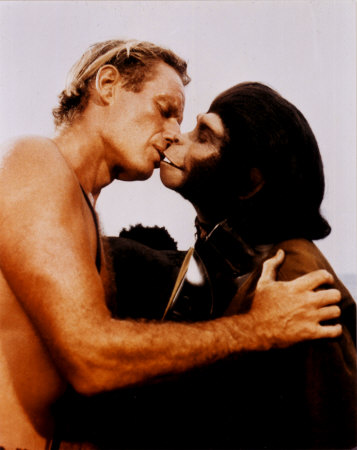 Charlton Heston kissing an ape