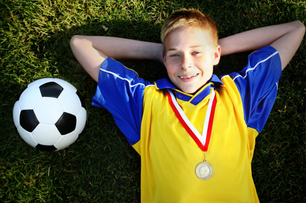 Boy with Soccer Award