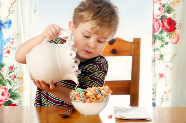 Child Pouring Milk