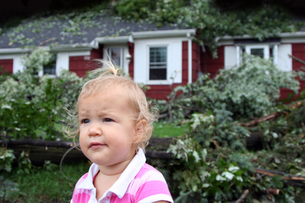 Little Girl in front of Fallen Tree