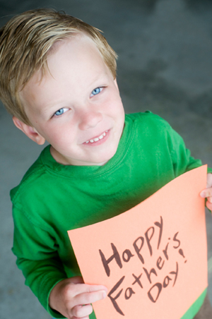 Boy with Homemade Father's Day Card