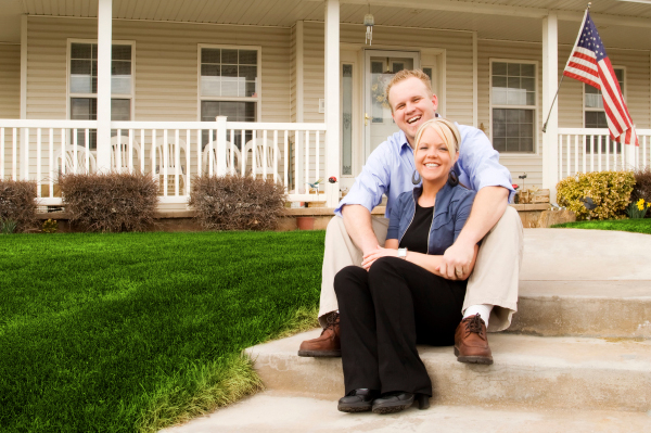 Couple in front of American Flag