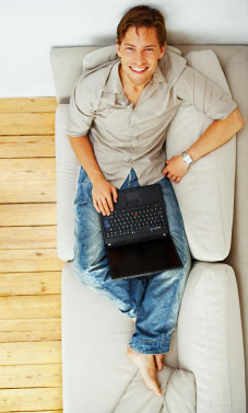Guy on a sofa with good grammar and spelling