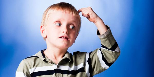 Child Scratching Head