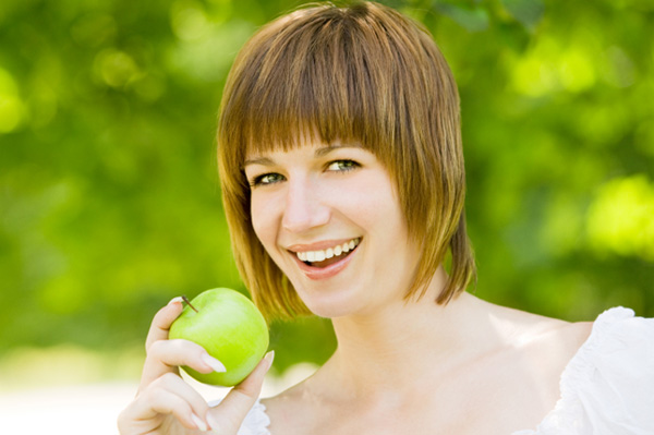 Woman Eating Apple