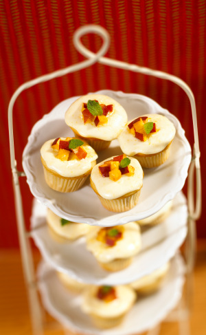 Mini vanilla almond peach cupcakes