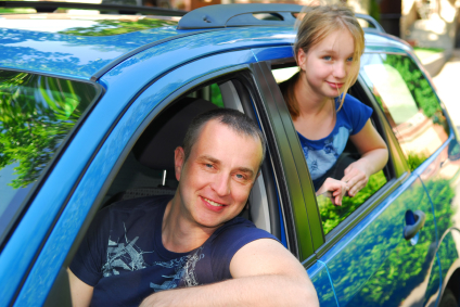 Dad and daughter in car