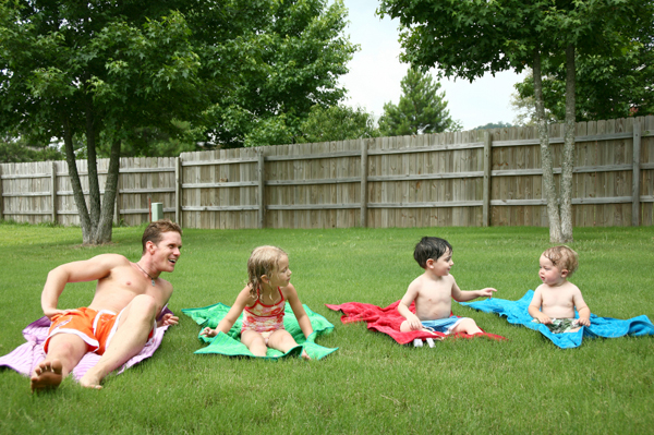 Family on Towels in the Backyard