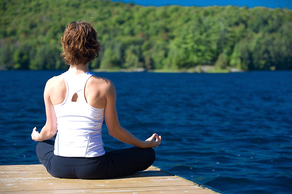Peaceful woman doing yoga