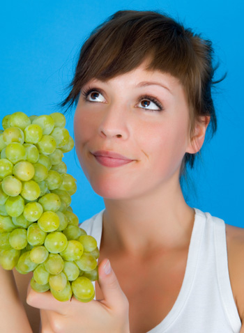 Woman with Grapes