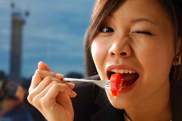 Businesswoman Eating Lunch