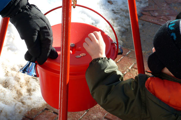 Boy Making Donation