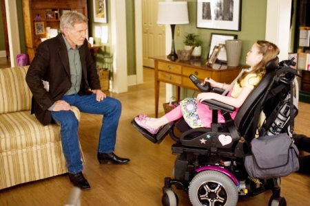Harrison Ford visits with a child he's trying to save in Extraordinary Measures