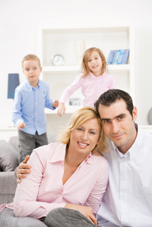 Family in clutter-free family room