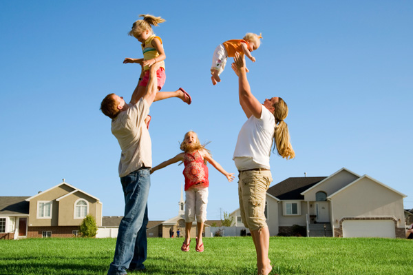 Family playing in sun