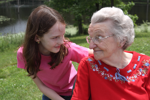 Girl spending time with senior