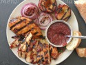 Grilled honey-balsamic chicken with red onion plum sauce
