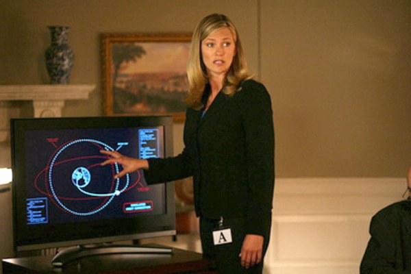 Natasha Henstridge briefs the president in Impact