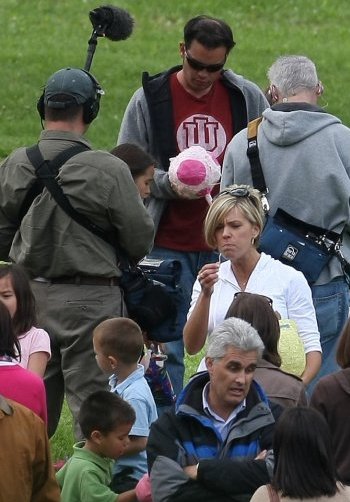 Jon and Kate film a birthday party -- notice Kate's security guard!