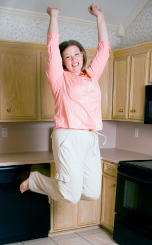 Woman Exercising in Kitchen