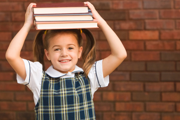 Little Girl in School Uniform. Arguments in favor of children wearing 