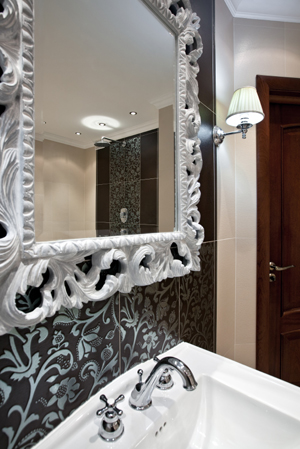 Master bathroom with framed mirror