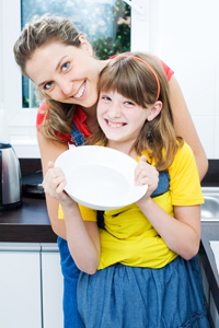 Mom and daughter doing chores