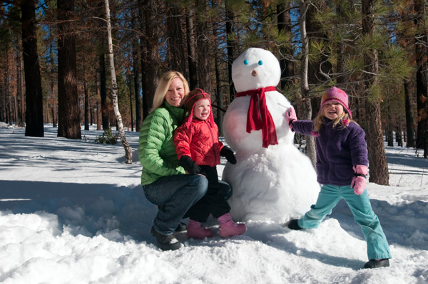 Mom building snowman