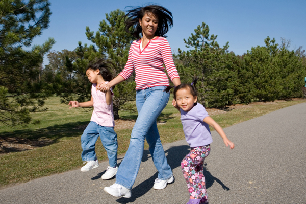 Mom out walking with two girls