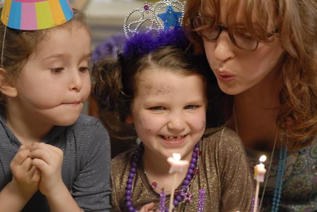 Uma celebrates a birthday in Motherhood