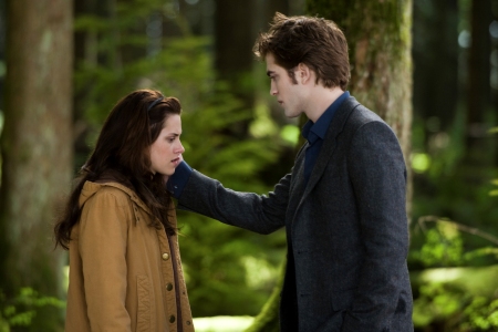 Kristen Stewart as Bella and Robert Pattinson as Edward in New Moon