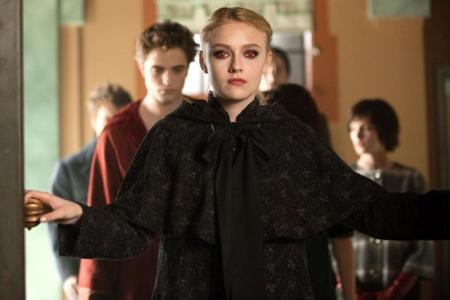 Dakota Fanning leads Edward (Robert Pattinson) into New Moon judgement