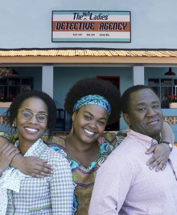 Jill Scott (center) runs the show