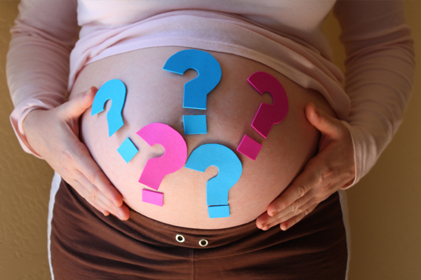 boy or girl pregnant belly