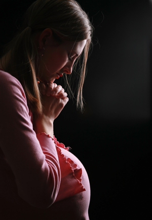 Pregant Woman Praying