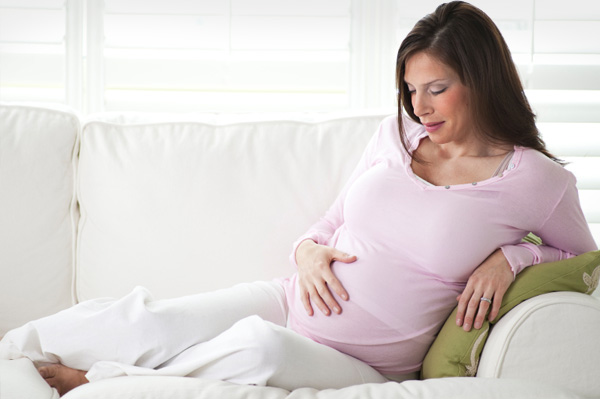 Pregnant woman thinking