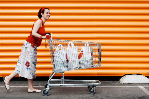 Pregnant woman with shopping cart