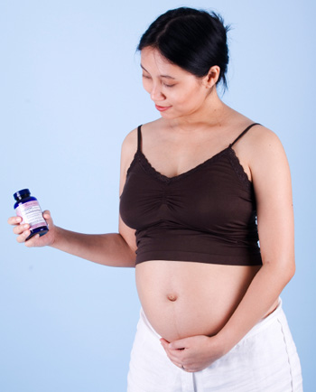 Pregnant Woman with Vitamins