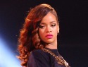 Rihanna and Chris Brown wage Twitter war over breakup