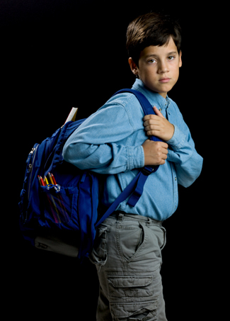 Sad boy with backpack