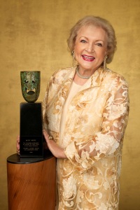 Betty White next to her SAG Award