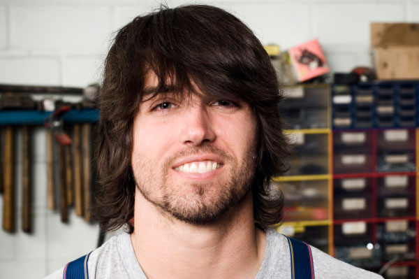 Smiling Boy in Garage