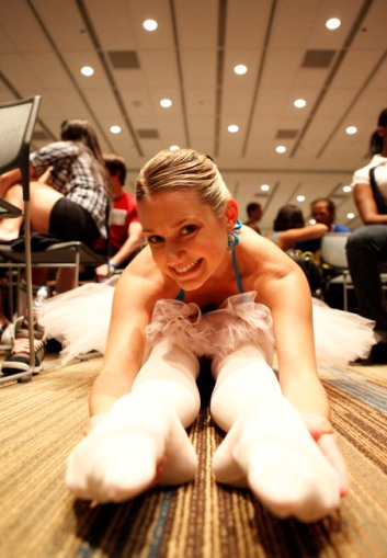 A dancer stretches as she readies for her So You Think You Can Dance audition