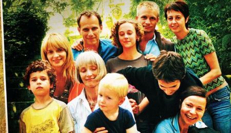Summer Hours' cast pose for a family photo