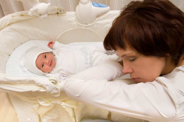 Tired Mother and Newborn