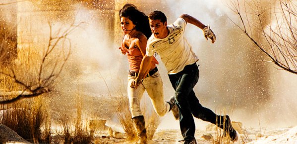 Shia LaBeouf and Megan Fox run for it in Transformers: Revenge of the Fallen