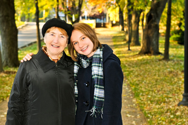 Tween taking walk with grandmother