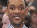 Will Smith lays the smack down on kissy reporter